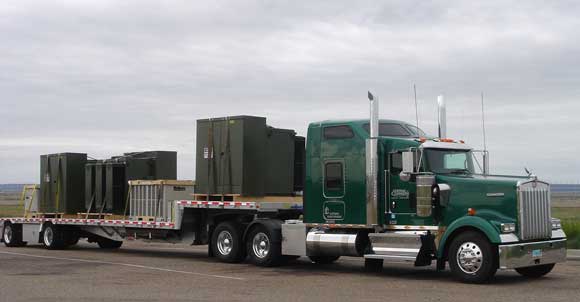 drop deck loaded truck with otr driver.