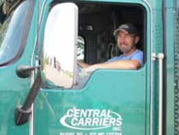 professional truck driver in truck.