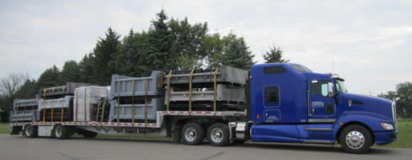 loaded truck with stepdeck freight.